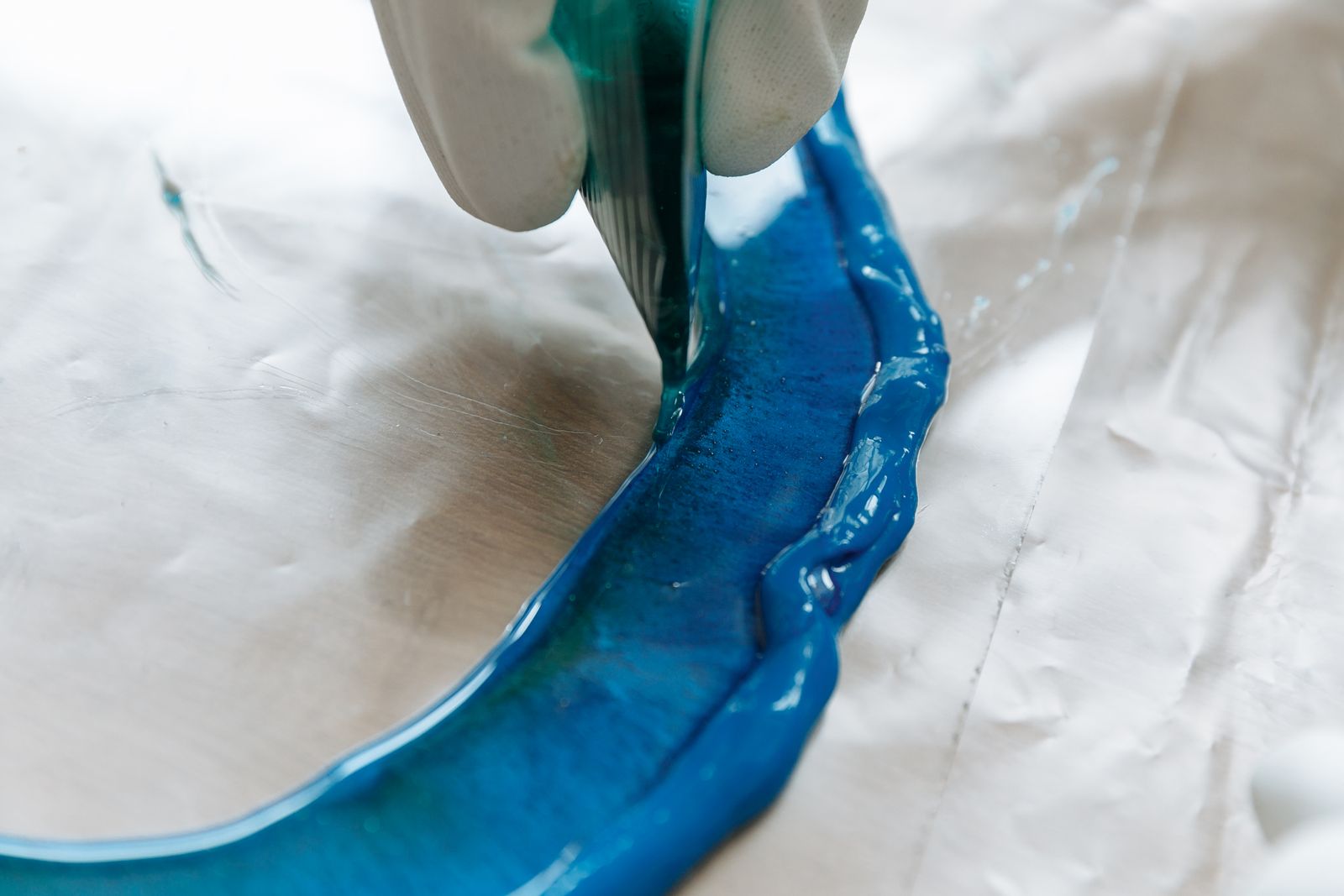 Metallic-style epoxy resin being poured during application
